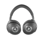 Gray over-ear headphones with perforated circular ear cups on a white background.