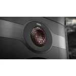 Close-up of a FOCAL speaker driver with a circular black housing and red lattice grille.