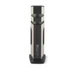 Back view of a tall floor-standing loudspeaker with a ribbed back panel and white side accents.