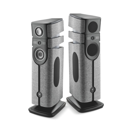 Pair of tall floor-standing speakers with gray fabric grilles and multiple drivers used in a home audio setup.