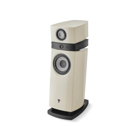 Cream floor-standing speaker with a small top speaker module and a large bottom woofer on a black curved base, labeled FOCAL on the midsection.