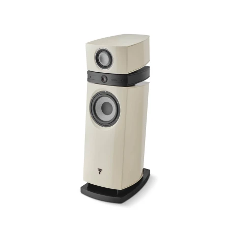 Cream floor-standing speaker with a small top speaker module and a large bottom woofer on a black curved base, labeled FOCAL on the midsection.